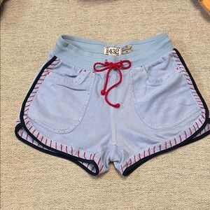 Stylish Light Blue Athletic Shorts with Red Accents